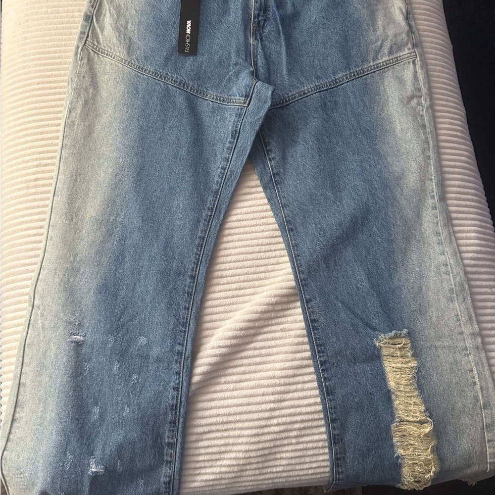 Fashion Nova Blue Distressed Flare Jeans